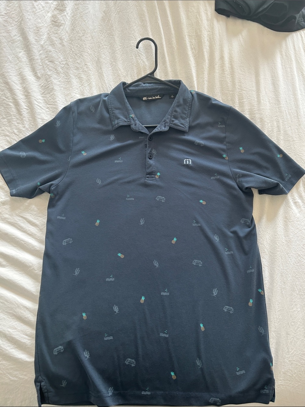 Travis Mathew Navy Polo with Teal and Light Gray Micro Motifs